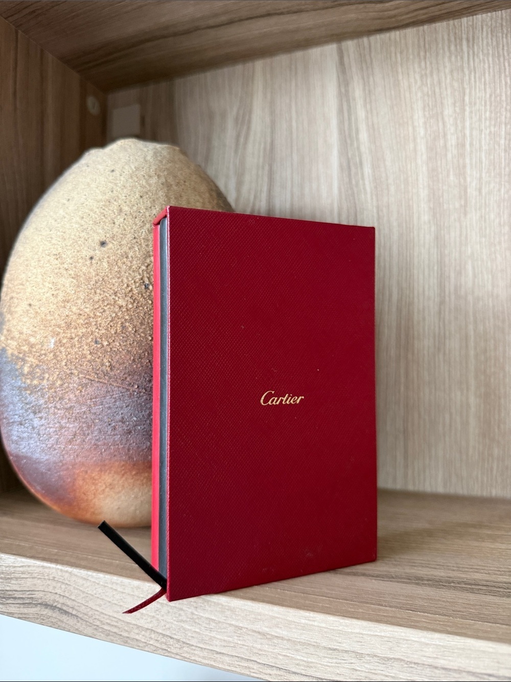 Cartier Red and Black Hardcover Notebooks with Gold Accents